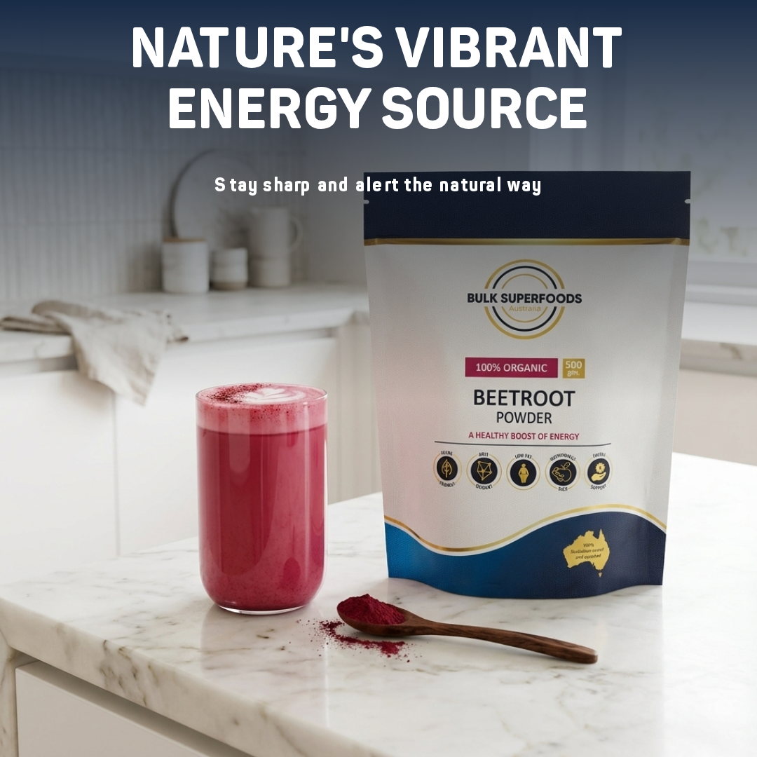 Beetroot powder packaging with a glass of pink juice on a marble countertop.