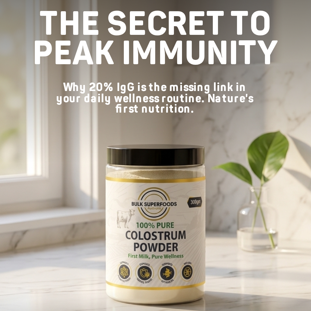 Colostrum powder container on a marble surface with promotional text about immunity and wellness.